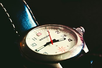 Round Silver-colored Wenger Analog Watch Reading 3:45