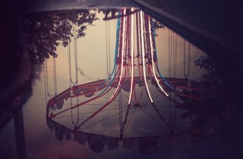 round white and red metal frame photo