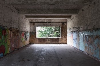 Ruin Building Full of Graffiti Artworks during Daytime