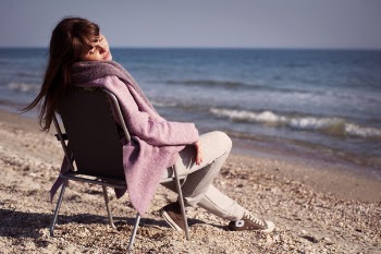 Rule of Thirds Photography of Woman Shitting on Chair