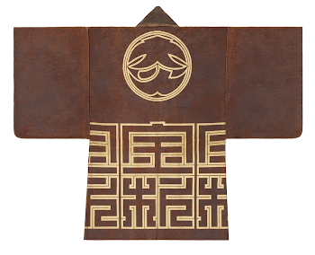 rust-colored leather; circular emblem on back | Free Photo - rawpixel
