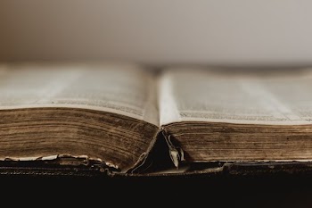 Rustic Old Book Open At Centre
