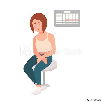 Sad girl sitting on stool with her hands on belly, suffering from menstrual pain and cramps, crying against calendar hanging on wall on background