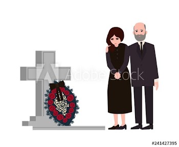 Sad man and woman dressed in mourning clothes standing near grave with tombstone and wreath