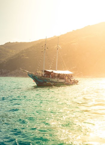 Sail Boat On Body Of Water