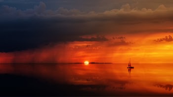 Sailboat On Body Of Water At Daytime