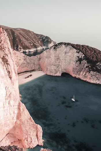 Sailboat on Calm Body of Water