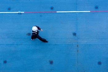 Sailor Walking on a Ships Deck