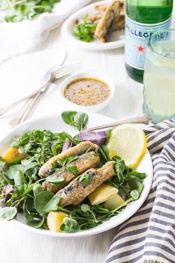 salad with sardines and lemon slice