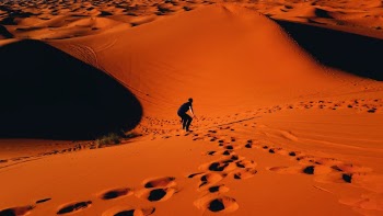 Sandsurfing in the Sahara.