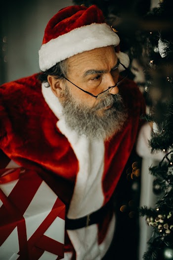 Santa Looking at the Christmas Tree