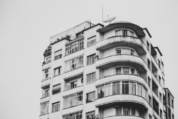 Satellite Dish on Grey Building Rooftop