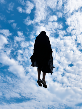 Saudi Woman in Flight: A Superhero in Black