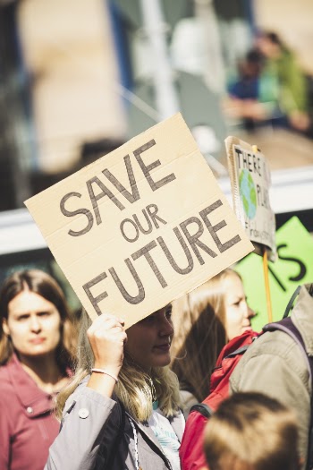 Save Our Future Signboard Close-up Photography