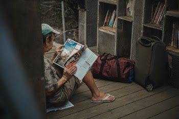 Saw this man in front of the mini library at the park. Indeed, reading makes a man.
