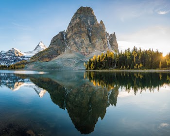 Scenic Photo of Lake and Mountain