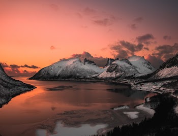 Scenic Photo of Lake Near Mountains