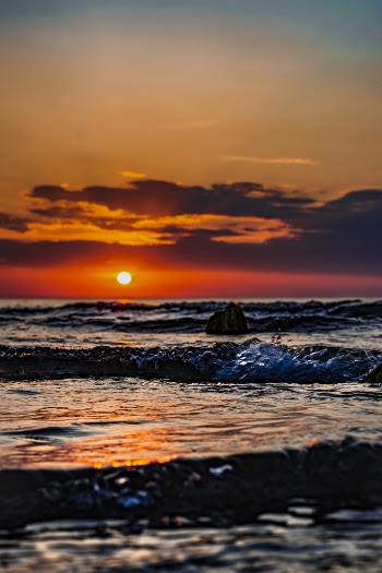 Scenic Photo Of Ocean During Dawn