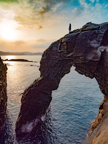 Scenic Photo Of Rock Cliff During Dawn