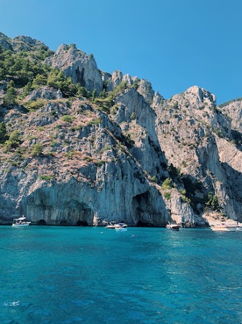 Scenic Photo of Rock Formations by the Sea
