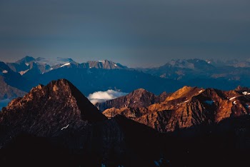 Scenic Photo Of Rocky Mountains During Daytime