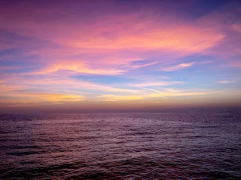 Scenic Photo of Sea Under Purple Sky