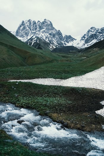 Scenic Photography Of Snow-Capped Mountains During  Daytime