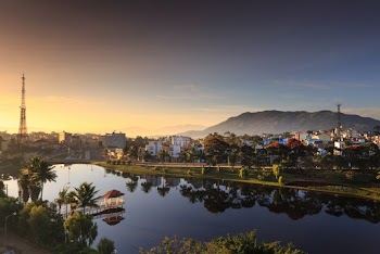 Scenic View Of City During Dawn