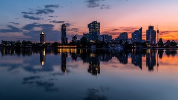 Scenic View Of City During Dawn