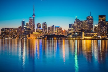Scenic View Of City During Dawn