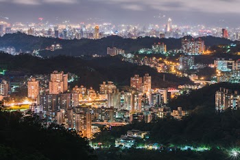 Scenic View of City During Evening