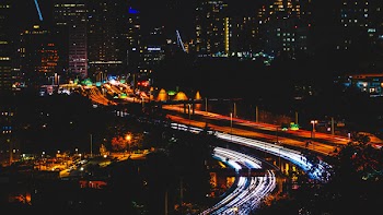 Scenic View Of City During Evening