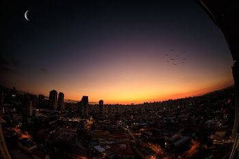 Scenic View of City During Sunset