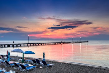 Scenic View Of Dock During Dawn