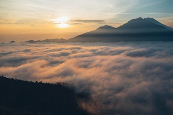 Scenic View Of Mountains During Dawn