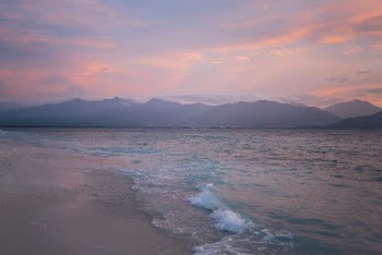 Scenic View Of Ocean During Dawn