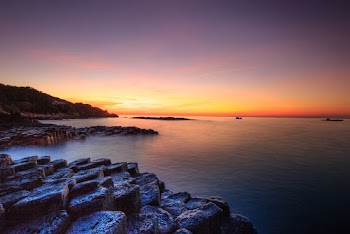 Scenic View Of Ocean During Dawn