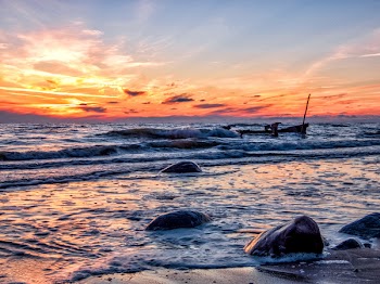 Scenic View Of Ocean During Dawn