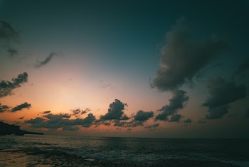 Scenic View Of Ocean During Dawn