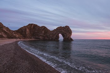 Scenic View Of Ocean During Dawn