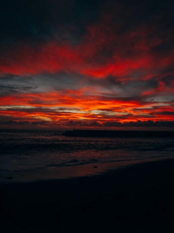 Scenic View Of Ocean During Dawn
