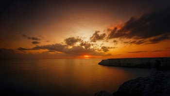 Scenic View of Ocean During Dusk