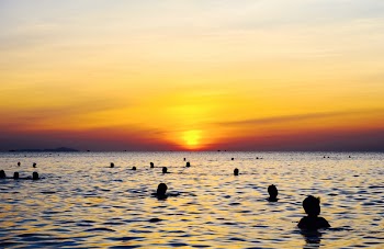 Scenic View Of Ocean During Sunset