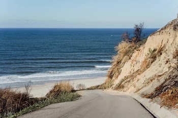 Scenic view of shore of the ocean, background. Nazare, Portugal.