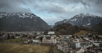 Scenic View Of Snow Capped Mountains