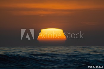 Scenic view of sunset over sea