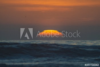 Scenic view of sunset over sea