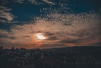 Scenic View Of Town During Dawn