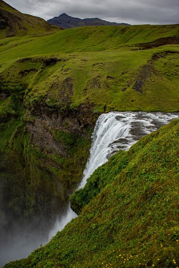 Scenic View Of Waterfalls During Daytime