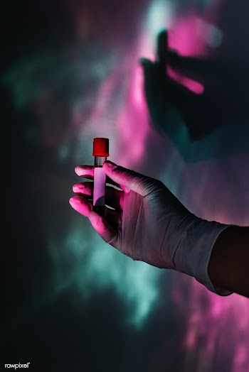 Scientist holding a test tube | Free  photo - 2290765